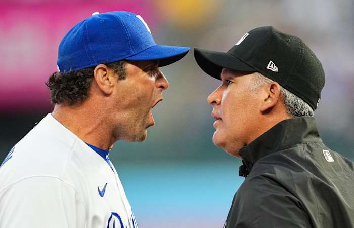 Apr 29, 2022; Kansas City, Missouri, USA; Kansas City Royals manager Mike Matheny (22) argues with umpire Manny Gonzalez (79) during the second inning against the New York Yankees at Kauffman Stadium. Mandatory Credit: Jay Biggerstaff-USA TODAY Sports